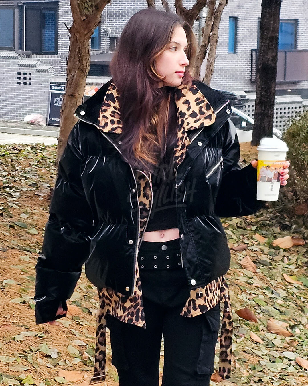  Oversized padded jacket featuring glossy black enamel with an integrated leopard layered detail